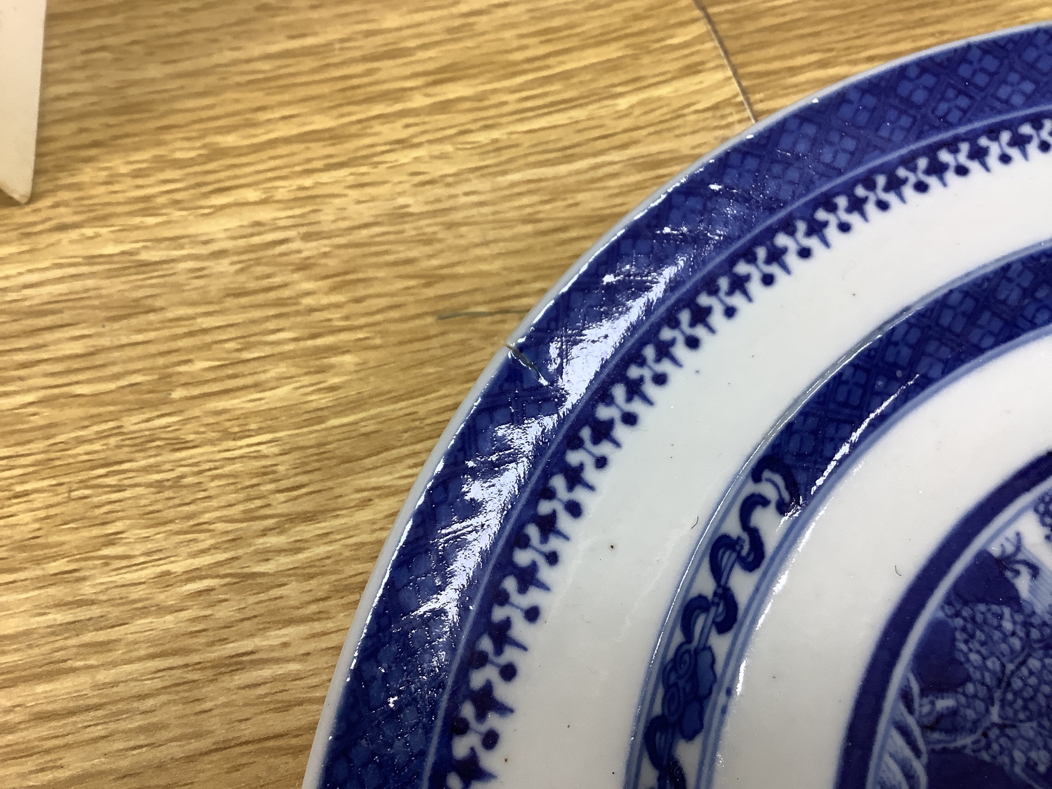 A set of seven 19th century Chinese blue and white plates, diameter 25cm